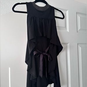 Very unique tie back ruffle top
